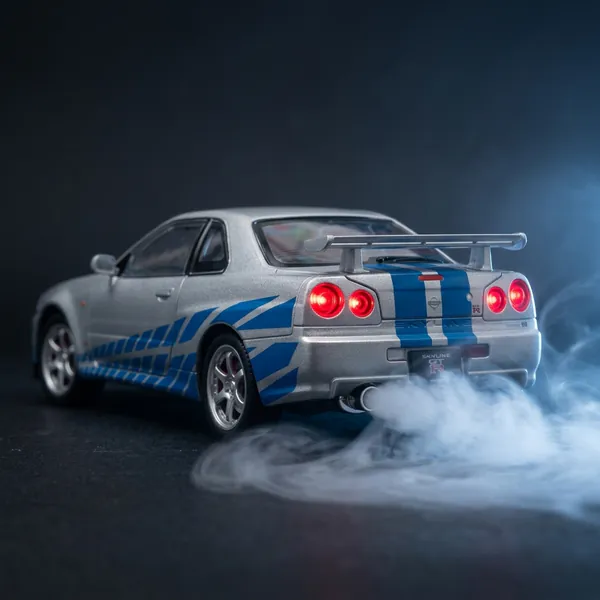 Silver Skyline with mist rolling out of the exhaust